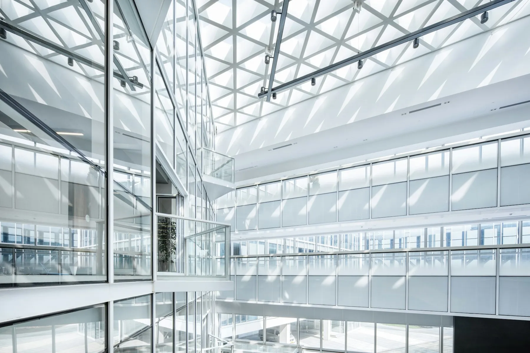 Corporate building facade seen from below
